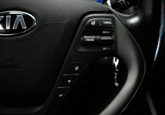 Подержанный автомобиль Kia Cerato Coupe 2013 года (16 фото)