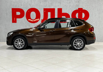 Подержанный автомобиль BMW X1 2013 года (8 фото)