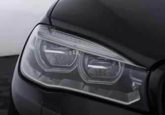 Подержанный автомобиль BMW X6 M 2017 года (23 фото)