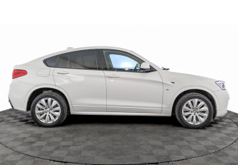 Подержанный автомобиль BMW X4 2015 года (4 фото)