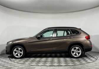 Подержанный автомобиль BMW X1 2014 года (5 фото)