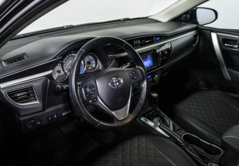 Подержанный автомобиль Toyota Corolla Sedan 2013 года (11 фото)