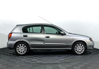 Подержанный автомобиль Nissan Almera Hatchback 2006 года (4 фото)