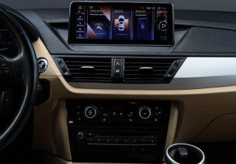 Подержанный автомобиль BMW X1 2013 года (10 фото)