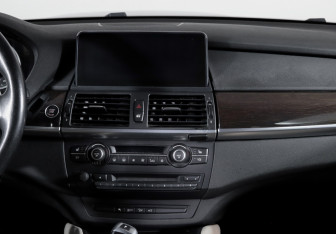 Подержанный автомобиль BMW X6 2013 года (13 фото)
