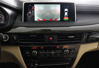 Подержанный автомобиль BMW X6 2015 года (15 фото)