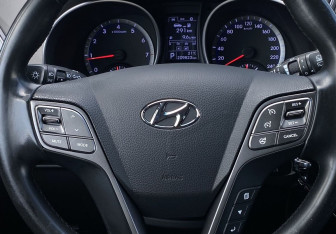 Подержанный автомобиль Hyundai Santa Fe 2014 года (15 фото)
