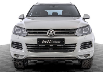 Подержанный автомобиль Volkswagen Touareg 2014 года (2 фото)
