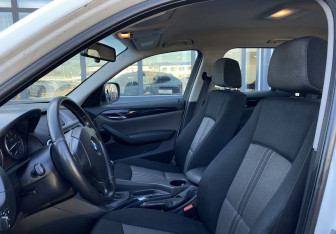 Подержанный автомобиль BMW X1 2011 года (18 фото)