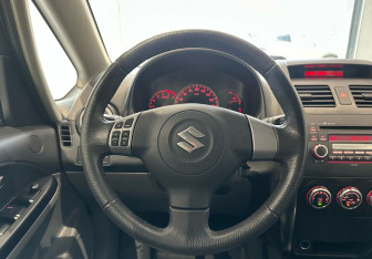 Подержанный автомобиль Suzuki SX4 Hatchback 2009 года (15 фото)