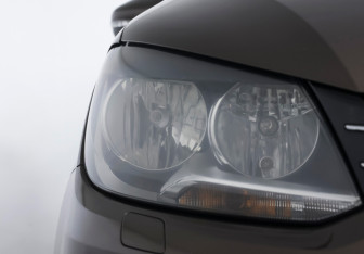 Подержанный автомобиль Volkswagen Touran 2013 года (18 фото)