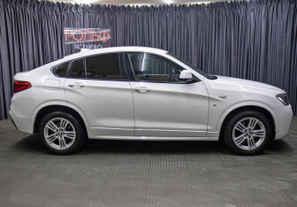 Подержанный автомобиль BMW X4 2016 года (4 фото)