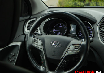 Подержанный автомобиль Hyundai Santa Fe 2015 года (11 фото)