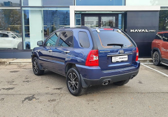 Подержанный автомобиль Kia Sportage 2009 года (7 фото)