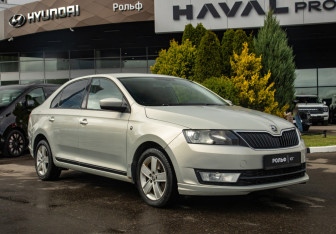 Подержанный автомобиль Skoda Rapid Liftback 2014 года (2 фото)
