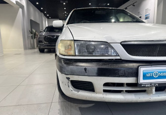 Подержанный автомобиль Toyota Corona Sedan 1998 года (9 фото)