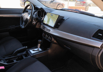 Подержанный автомобиль Mitsubishi Lancer Sedan 2008 года (7 фото)