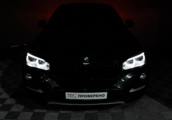 Подержанный автомобиль BMW X6 2016 года (19 фото)