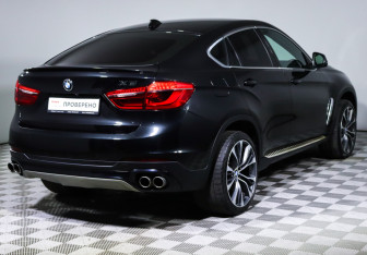Подержанный автомобиль BMW X6 2015 года (5 фото)