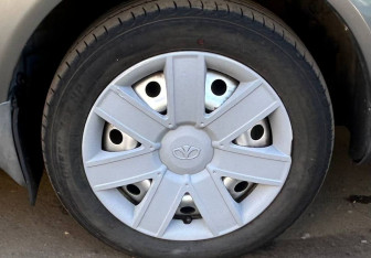 Подержанный автомобиль Daewoo Gentra Sedan 2014 года (13 фото)