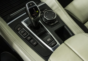 Подержанный автомобиль BMW X6 2015 года (16 фото)