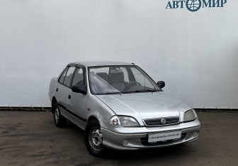 Подержанный автомобиль Suzuki Swift Sedan 2002 года (3 фото)