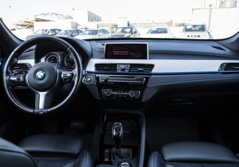 Подержанный автомобиль BMW X1 2019 года (12 фото)