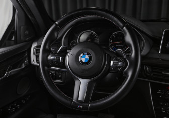 Подержанный автомобиль BMW X6 2014 года (14 фото)