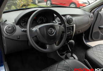 Подержанный автомобиль Nissan Almera Sedan 2015 года (15 фото)