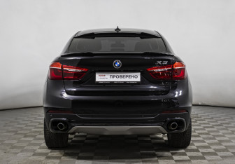 Подержанный автомобиль BMW X6 2015 года (6 фото)