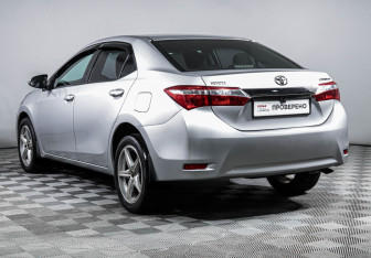 Подержанный автомобиль Toyota Corolla Sedan 2014 года (7 фото)