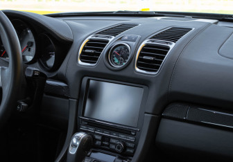 Подержанный автомобиль Porsche Cayman 2013 года (11 фото)