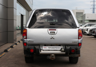 Подержанный автомобиль Mitsubishi L200 2011 года (6 фото)
