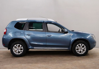 Подержанный автомобиль Nissan Terrano 2014 года (8 фото)