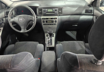 Подержанный автомобиль Toyota Corolla Sedan 2003 года (9 фото)