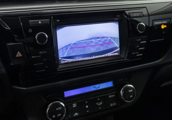 Подержанный автомобиль Toyota Corolla Sedan 2013 года (16 фото)