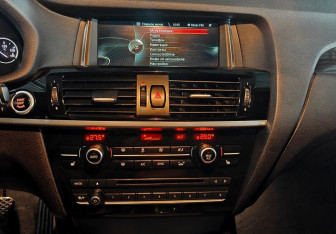 Подержанный автомобиль BMW X4 2015 года (14 фото)