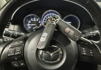 Подержанный автомобиль Mazda CX-5 2014 года (15 фото)