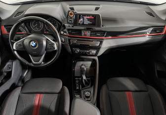 Подержанный автомобиль BMW X1 2015 года (11 фото)