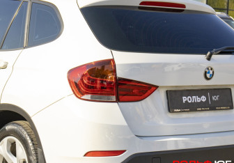 Подержанный автомобиль BMW X1 2014 года (21 фото)