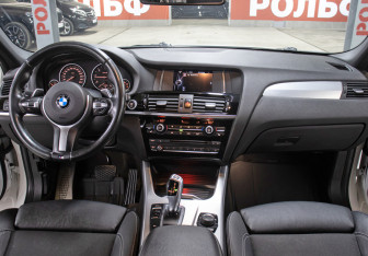 Подержанный автомобиль BMW X4 2017 года (14 фото)
