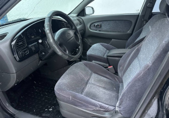 Подержанный автомобиль Kia Spectra Sedan 2007 года (9 фото)