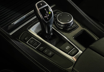 Подержанный автомобиль BMW X6 2016 года (18 фото)