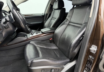 Подержанный автомобиль BMW X6 2014 года (10 фото)