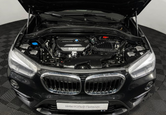 Подержанный автомобиль BMW X1 2017 года (10 фото)