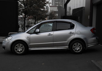 Подержанный автомобиль Suzuki SX4 Sedan 2010 года (8 фото)