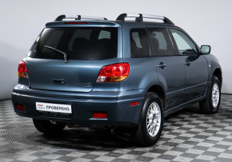 Подержанный автомобиль Mitsubishi Outlander 2003 года (5 фото)