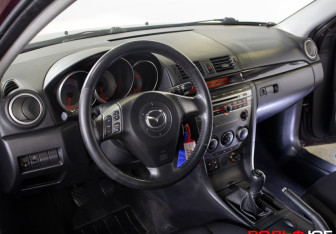 Подержанный автомобиль Mazda 3 Hatchback 2007 года (13 фото)