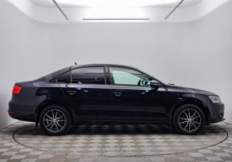 Подержанный автомобиль Volkswagen Jetta Sedan 2014 года (6 фото)