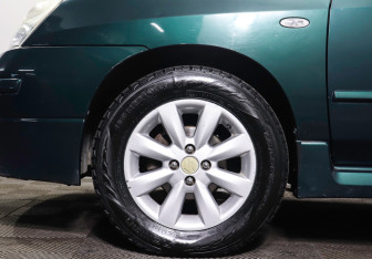 Подержанный автомобиль Suzuki Liana Wagon 2004 года (22 фото)